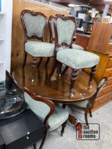 Seven Piece Tilt Top Dining Suite